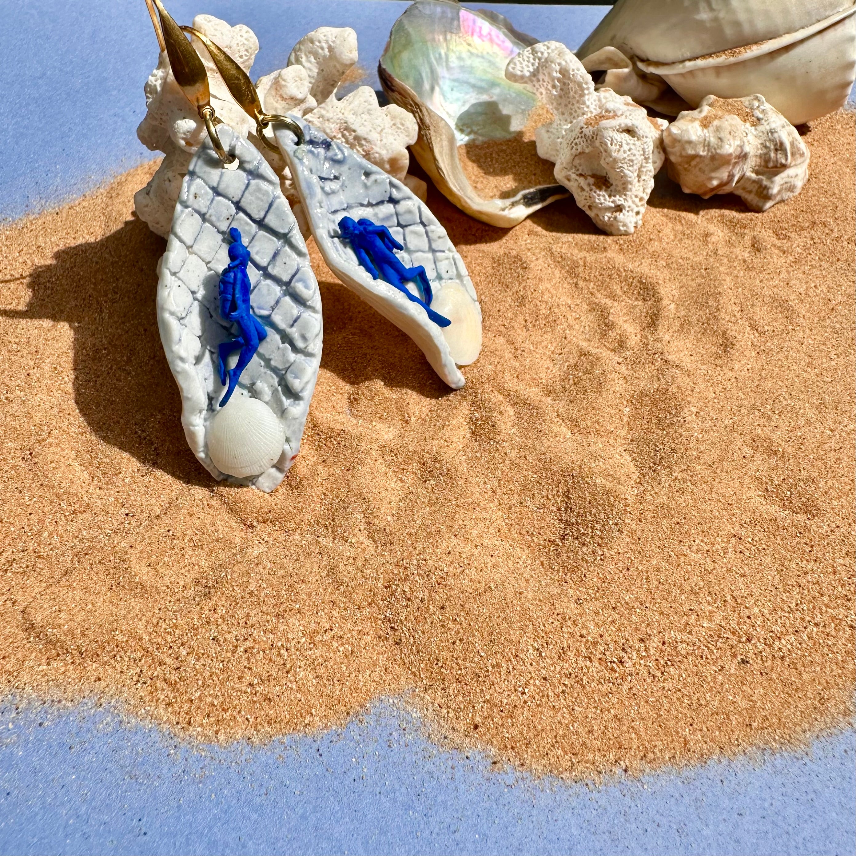 Boucles d'oreilles "Pris dans les filets du Club Med"