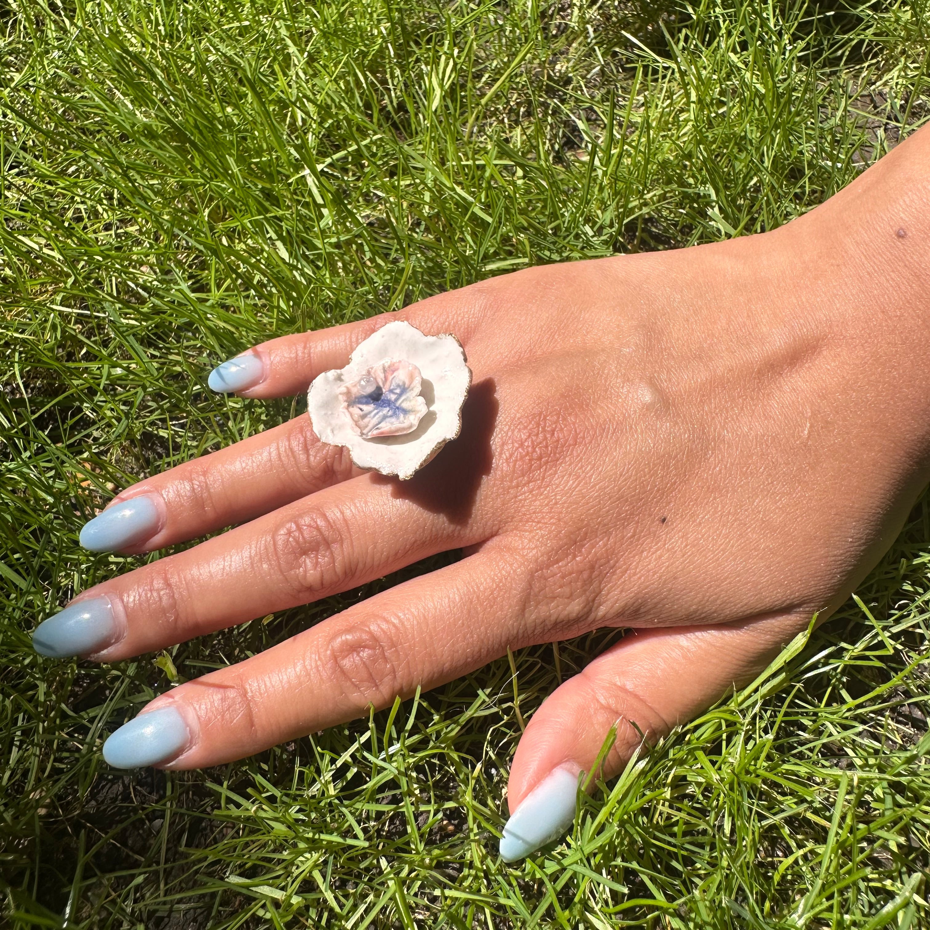Bague tournoyante "Double corolle"