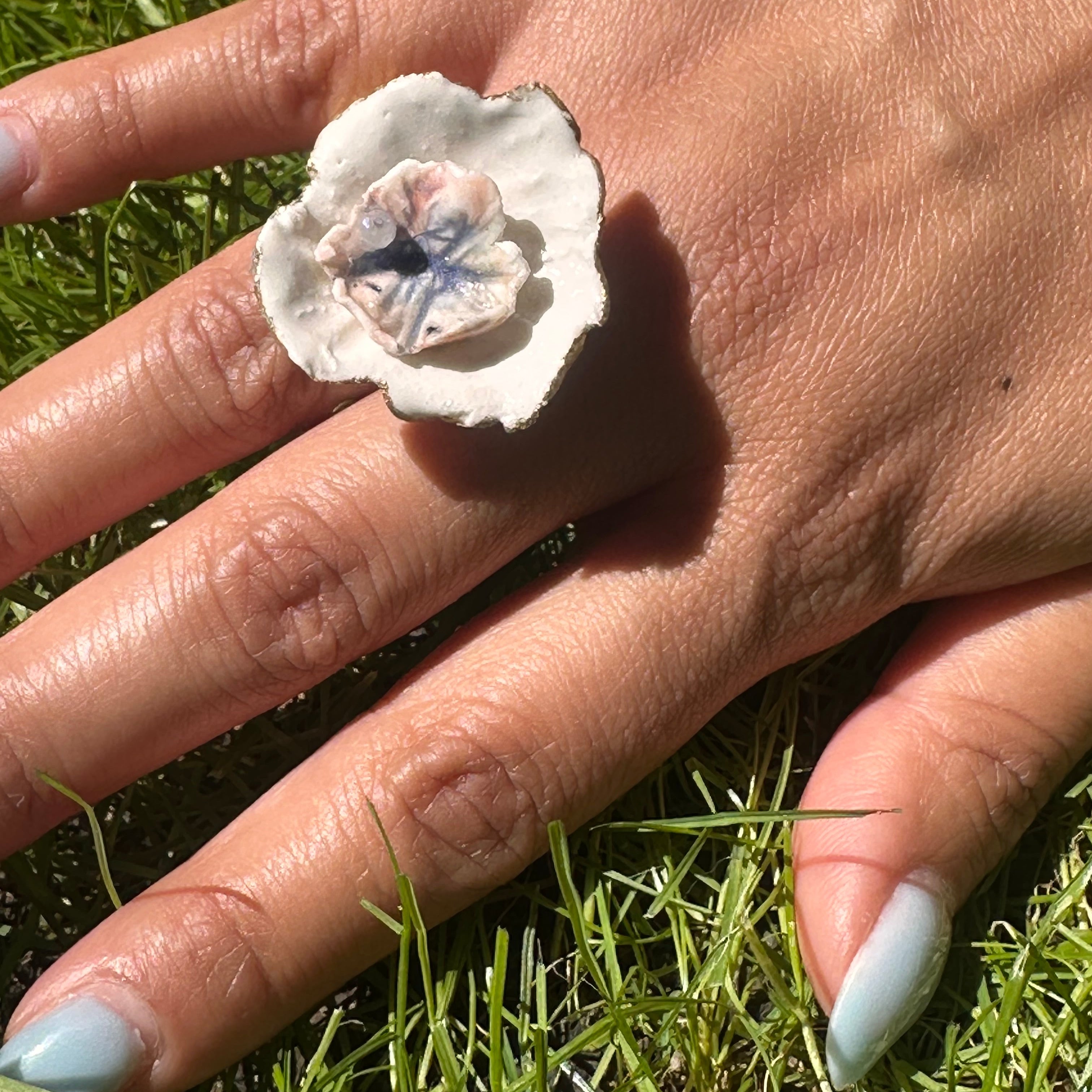 Bague tournoyante "Double corolle"